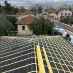 Rénovation couverture : Pose d'un écran sous toiture et liteaux
